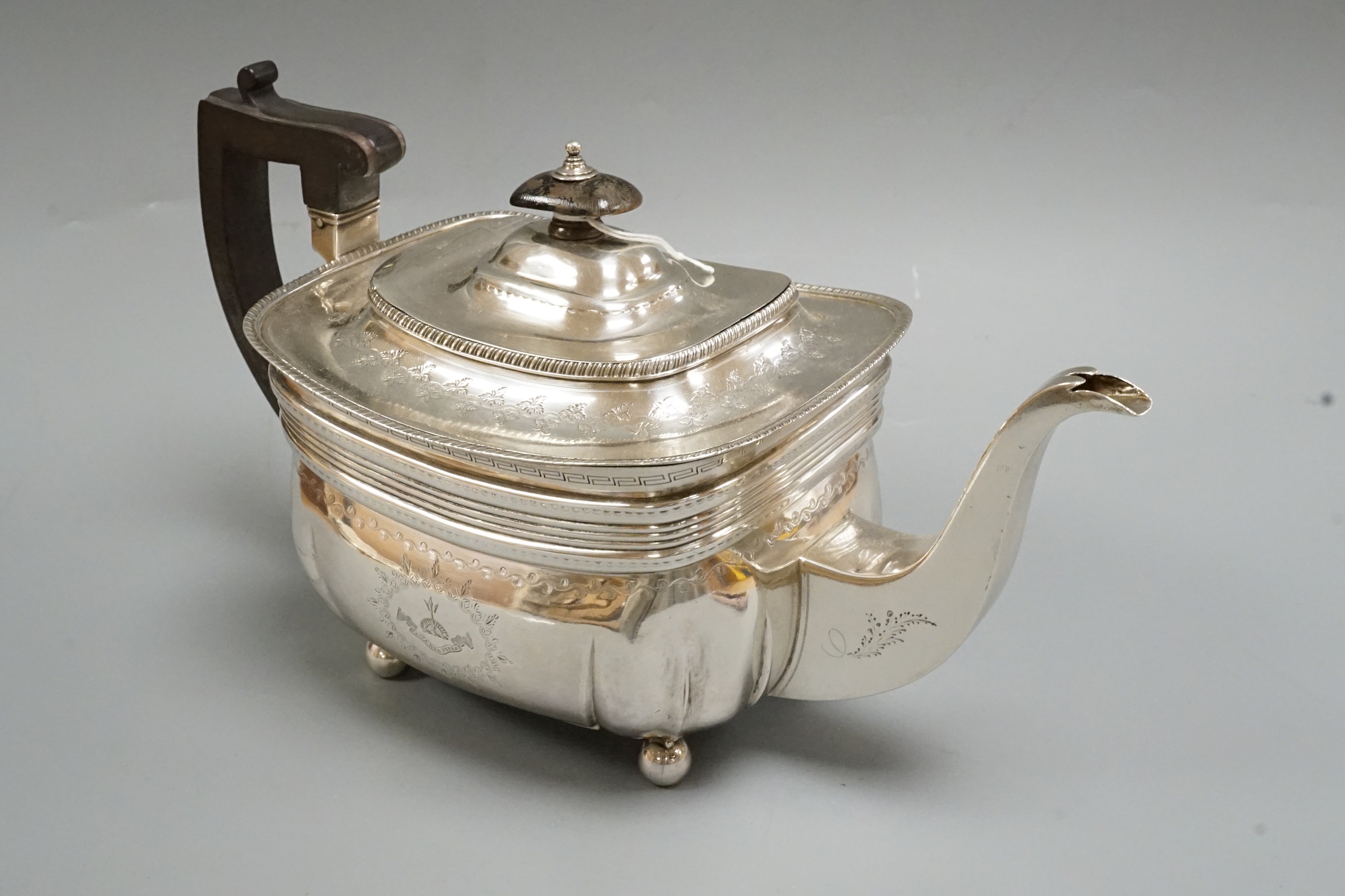 A George III chased silver teapot, by Peter & William Bateman, London, 1811, gross weight 20.1oz.